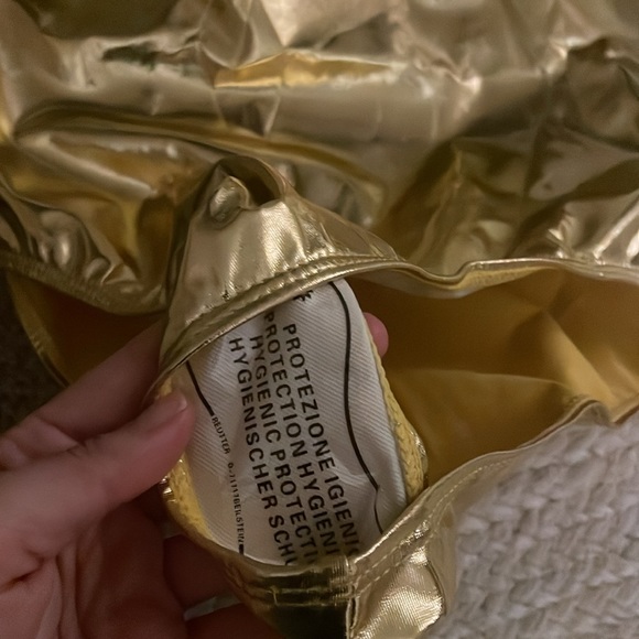 Gold one piece suit. - Picture 6 of 6